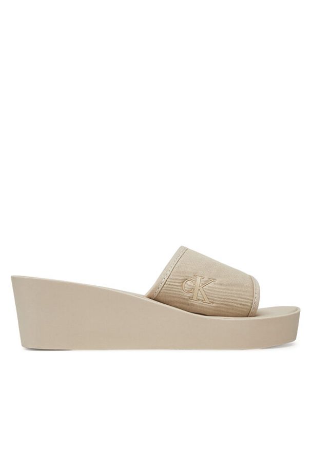 Calvin Klein Jeans Klapki Beach Wedge Slide Canvas YW0YW01725 Beżowy. Kolor: beżowy. Materiał: materiał