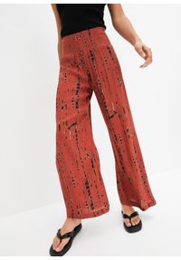 bonprix - Spodnie palazzo z lejącej wiskozy. Kolor: czerwony. Materiał: wiskoza. Wzór: nadruk #1