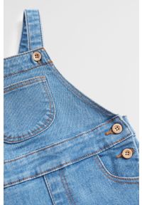 Mango Kids - Kombinezon dziecięcy Emille 809-104 cm. Kolor: niebieski. Materiał: bawełna, jeans, denim, materiał, elastan, poliester. Długość rękawa: na ramiączkach. Długość: długie. Wzór: gładki #3
