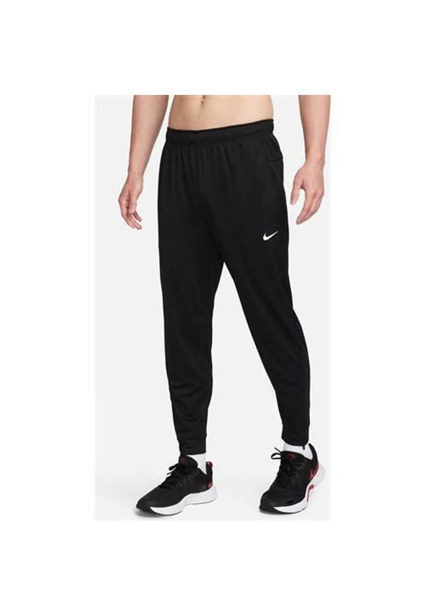 Spodnie sportowe damskie Nike Totality. Kolor: czarny. Materiał: materiał, syntetyk