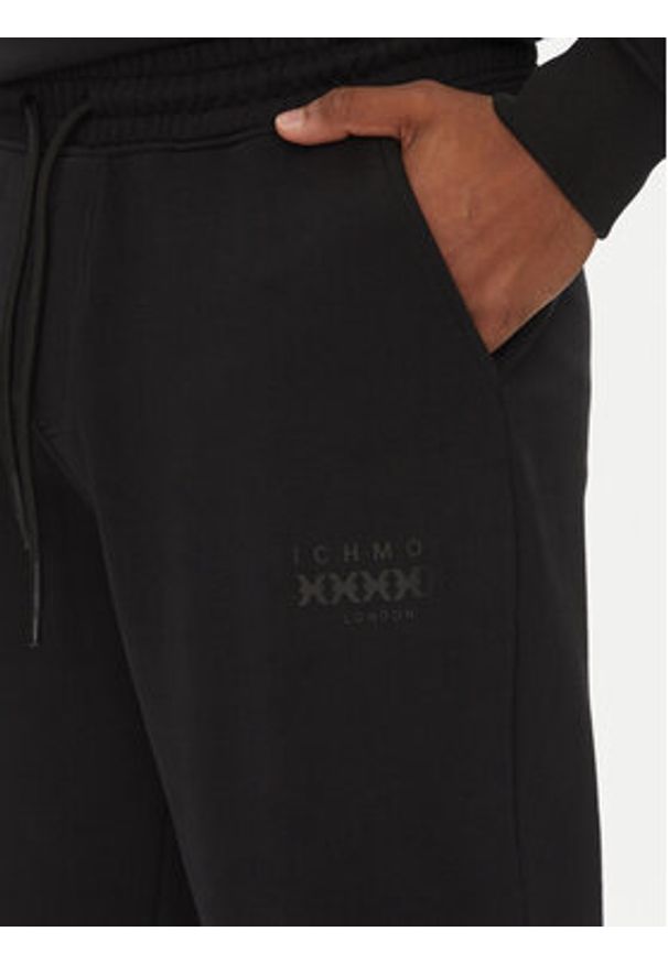 John Richmond Spodnie dresowe UMP25008PA Czarny Regular Fit. Kolor: czarny. Materiał: bawełna