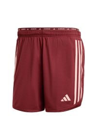 Adidas - Szorty Own the Run 3-Stripes. Kolor: czerwony. Materiał: materiał. Sport: bieganie