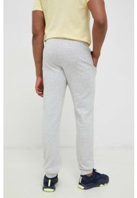 Fila spodnie dresowe kolor szary gładkie. Kolor: szary. Materiał: dresówka. Wzór: gładki #3