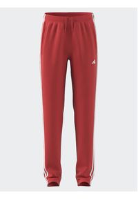 Adidas - adidas Spodnie dresowe Train Essentials AEROREADY 3-Stripes Regular-Fit Joggers IJ9549 Czerwony Regular Fit. Kolor: czerwony. Materiał: syntetyk