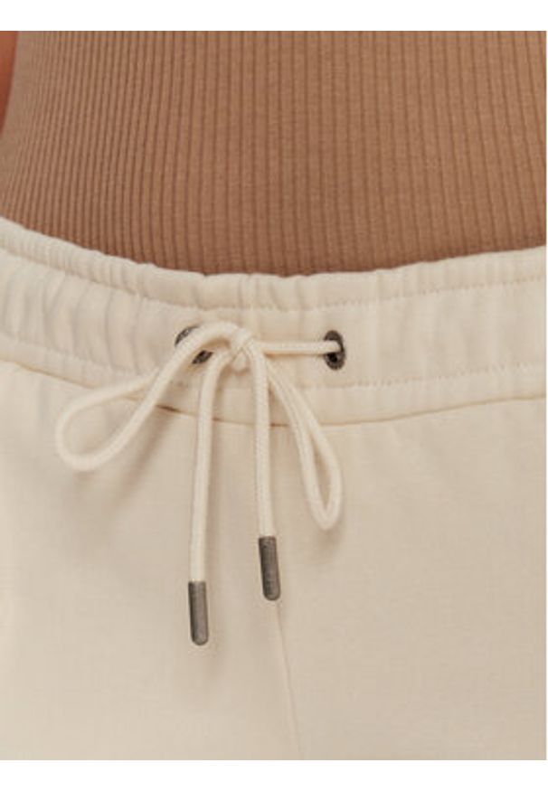 Guess Jeans Spodnie dresowe W5BB04 KC811 Beżowy Wide Leg. Kolor: beżowy. Materiał: bawełna