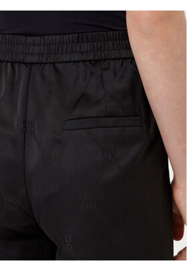 Hugo - HUGO Spodnie materiałowe Harida-1 50538802 Czarny Relaxed Fit. Kolor: czarny. Materiał: syntetyk