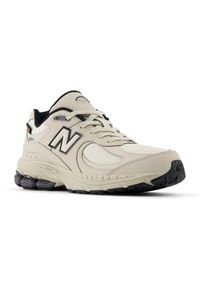 Buty dziecięce New Balance GC2002PM – beżowe. Okazja: na uczelnię, na co dzień. Kolor: beżowy. Materiał: tkanina, guma. Szerokość cholewki: normalna. Sport: turystyka piesza #4