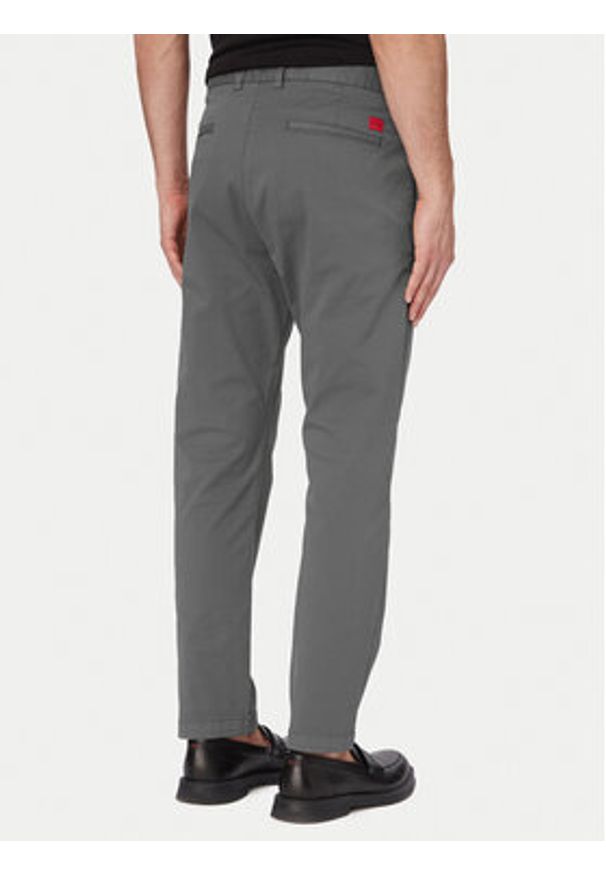 Hugo - HUGO Chinosy David251D 50530886 Szary ciemny Slim Fit. Kolor: szary. Materiał: bawełna
