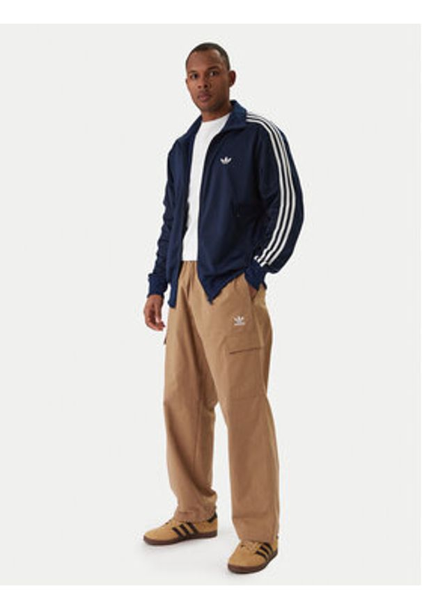Adidas - adidas Bluza Firebird KD8313 Granatowy Loose Fit. Kolor: niebieski. Materiał: syntetyk