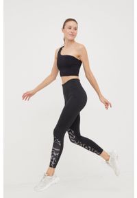 Reebok legginsy do biegania damskie kolor czarny z nadrukiem. Kolor: czarny. Materiał: poliester, skóra, dzianina, materiał. Wzór: nadruk #4