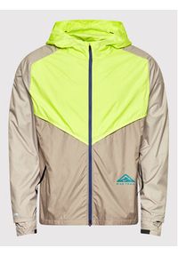 Nike Kurtka do biegania Windrunner CZ9054 Beżowy Standard Fit. Kolor: beżowy. Materiał: syntetyk