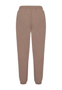 Reebok Spodnie dresowe Kalina RK25694CCW - LIGHT COCOA/LINEN Brązowy Relaxed Fit. Kolor: brązowy. Materiał: syntetyk #9