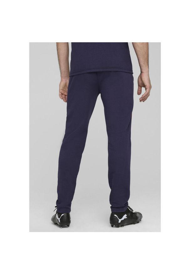 Puma - Męskie spodnie Casuals FC Red Bull Salzburg PUMA Navy Red Blue. Kolor: czerwony, wielokolorowy, niebieski. Materiał: materiał