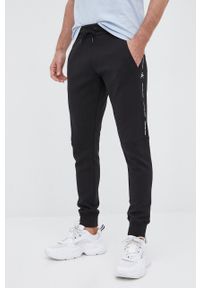 Calvin Klein Jeans Spodnie męskie kolor czarny z nadrukiem. Kolor: czarny. Materiał: włókno, dzianina. Wzór: nadruk