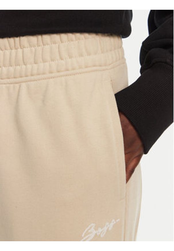 BOSS Spodnie dresowe 50540278 Beżowy Regular Fit. Kolor: beżowy. Materiał: dresówka