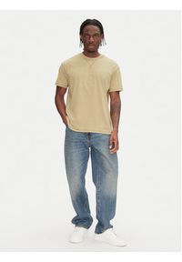 Tommy Jeans T-Shirt Tonal Crest DM0DM20805 Beżowy Relaxed Fit. Kolor: beżowy. Materiał: bawełna