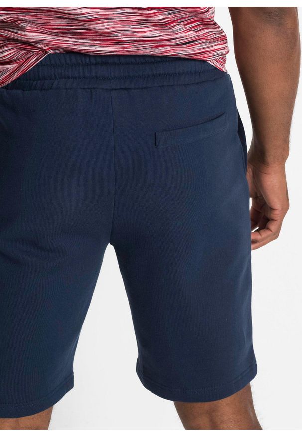 bonprix - Bermudy dresowe z czystej bawełny. Kolor: niebieski. Materiał: bawełna, dresówka. Wzór: nadruk, aplikacja