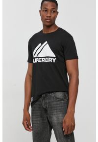 Superdry T-shirt bawełniany kolor czarny z nadrukiem. Okazja: na co dzień. Kolor: czarny. Materiał: bawełna. Wzór: nadruk. Styl: casual