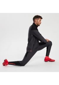 KIPSTA - Spodnie do piłki nożnej Kipsta Viralto Solo. Kolor: czerwony, różowy, czarny, szary, wielokolorowy. Materiał: elastan, materiał. Sport: piłka nożna #1