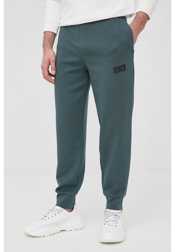 Armani Exchange spodnie 3LZPHC.ZJZDZ męskie kolor zielony gładkie. Kolor: zielony. Materiał: dzianina. Wzór: gładki