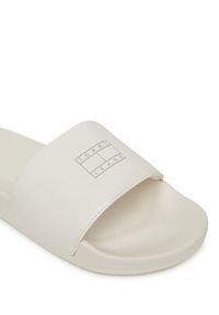 Tommy Jeans Klapki Flag Pool Slide Patent EN0EN02901 Biały. Kolor: biały. Materiał: skóra