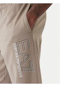 EA7 Emporio Armani Spodnie dresowe 7M001316 AF13512 U6167 Beżowy Regular Fit. Kolor: beżowy. Materiał: bawełna #3