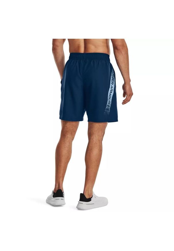 Spodenki krótkie męskie Under Armour Woven Graphic Shorts. Kolor: niebieski. Materiał: poliester. Długość: krótkie. Sport: fitness