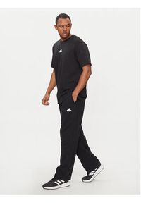 Adidas - adidas Spodnie dresowe Embroidered IS2028 Czarny Relaxed Fit. Kolor: czarny. Materiał: bawełna #2