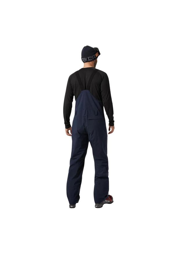 Spodnie ogrodniczki Helly Hansen legendary insulated bib. Kolor: niebieski. Sezon: zima. Sport: narciarstwo