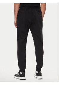 Adidas - adidas Spodnie dresowe Essentials Fleece Regular Tapered Joggers HL2236 Czarny Regular Fit. Kolor: czarny. Materiał: bawełna #6