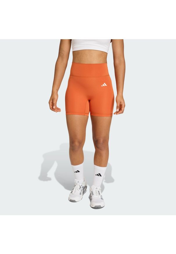 Adidas - Krótkie legginsy Optime Essentials Workout. Stan: podwyższony. Kolor: pomarańczowy. Technologia: ClimaCool (Adidas). Długość: krótkie. Sport: fitness