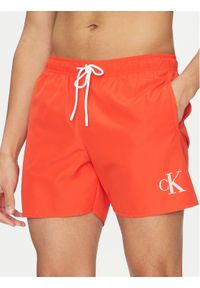 Calvin Klein Swimwear Szorty kąpielowe KM0KM01101 Czerwony Regular Fit. Kolor: czerwony. Materiał: syntetyk