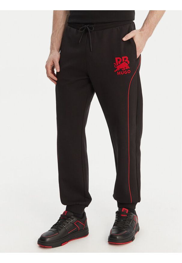 Hugo - HUGO Spodnie dresowe Dusson_RB 50559707 Czarny Relaxed Fit. Kolor: czarny. Materiał: bawełna