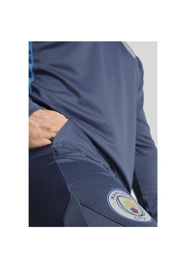 Puma - Męskie spodnie treningowe Manchester City PUMA Inky Blue Magic. Kolor: niebieski