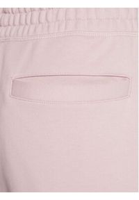 New Balance Spodnie dresowe Athletics Nature WP23553 Różowy Relaxed Fit. Kolor: różowy. Materiał: bawełna