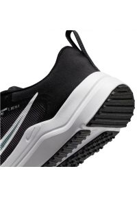 Buty do biegania Nike Downshifter 12 Jr DM4194 003 czarne. Kolor: czarny. Materiał: materiał, tkanina, syntetyk, guma. Szerokość cholewki: normalna. Sezon: jesień. Model: Nike Downshifter #5