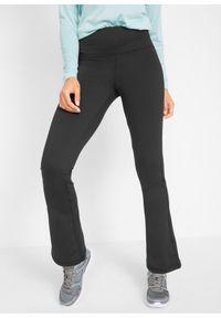 bonprix - Spodnie sportowe shape, z kieszenią i poszerzanymi nogawkami. Kolor: czarny. Materiał: materiał. Styl: sportowy
