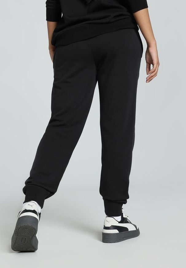 Puma - Damskie spodnie dresowe z małym logo No.1 ESS PUMA Black. Kolor: czarny. Materiał: dresówka, bawełna
