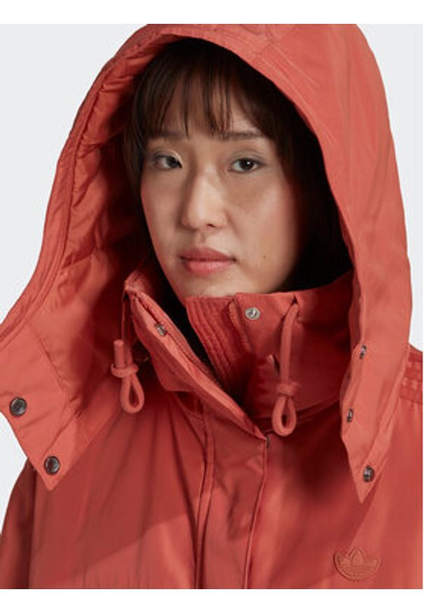 Adidas - adidas Kurtka przejściowa Parka HK5248 Pomarańczowy Loose Fit. Kolor: pomarańczowy. Materiał: syntetyk