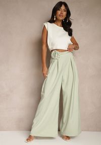 Renee - Zielone Spodnie o Szerokim Kroju High Waist z Kwiatem 3D Firalisse. Okazja: na co dzień. Stan: podwyższony. Kolor: zielony. Wzór: kwiaty. Styl: klasyczny, elegancki, casual