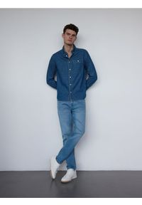 Reserved - Jeansy slim fit - niebieski. Kolor: niebieski