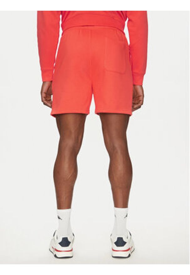 Tommy Jeans Szorty sportowe Flag Beach DM0DM21931 Pomarańczowy Regular Fit. Kolor: pomarańczowy. Materiał: bawełna. Styl: sportowy
