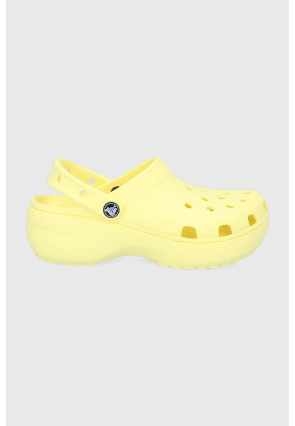 Crocs Klapki damskie na platformie. Nosek buta: okrągły. Kolor: żółty. Materiał: guma. Obcas: na platformie