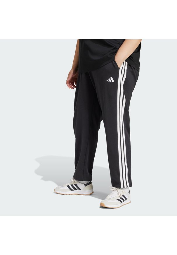 Adidas - Spodnie Essentials 3-Stripes French Terry Cuffed. Kolor: czarny, biały, wielokolorowy. Materiał: materiał. Sport: fitness