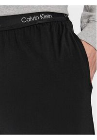 Calvin Klein Underwear Spodnie piżamowe 000NM2235A Czarny Regular Fit. Kolor: czarny