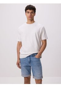 Reserved - Jeansowe szorty slim fit - niebieski. Kolor: niebieski. Materiał: jeans