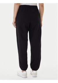 Calvin Klein Jeans Spodnie dresowe Foil Monologo LV047E826G Czarny Regular Fit. Kolor: czarny. Materiał: bawełna #2