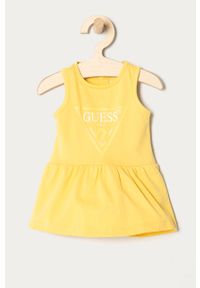 Guess - Sukienka dziecięca 62-96 cm. Kolor: żółty. Materiał: bawełna, dzianina. Wzór: nadruk. Typ sukienki: rozkloszowane #1