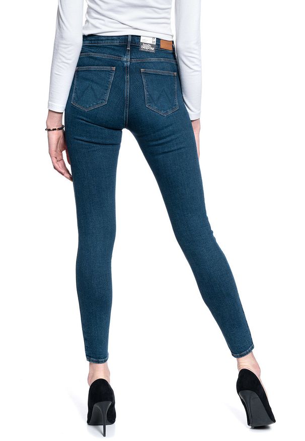 Wrangler - SPODNIE DAMSKIE WRANGLER HIGH RISE SKINNY VINTAGE INK W27HGD18I 112128079. Styl: vintage