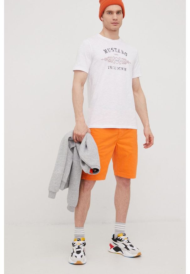 Superdry szorty męskie kolor pomarańczowy. Okazja: na co dzień. Kolor: pomarańczowy. Materiał: bawełna, materiał. Styl: casual